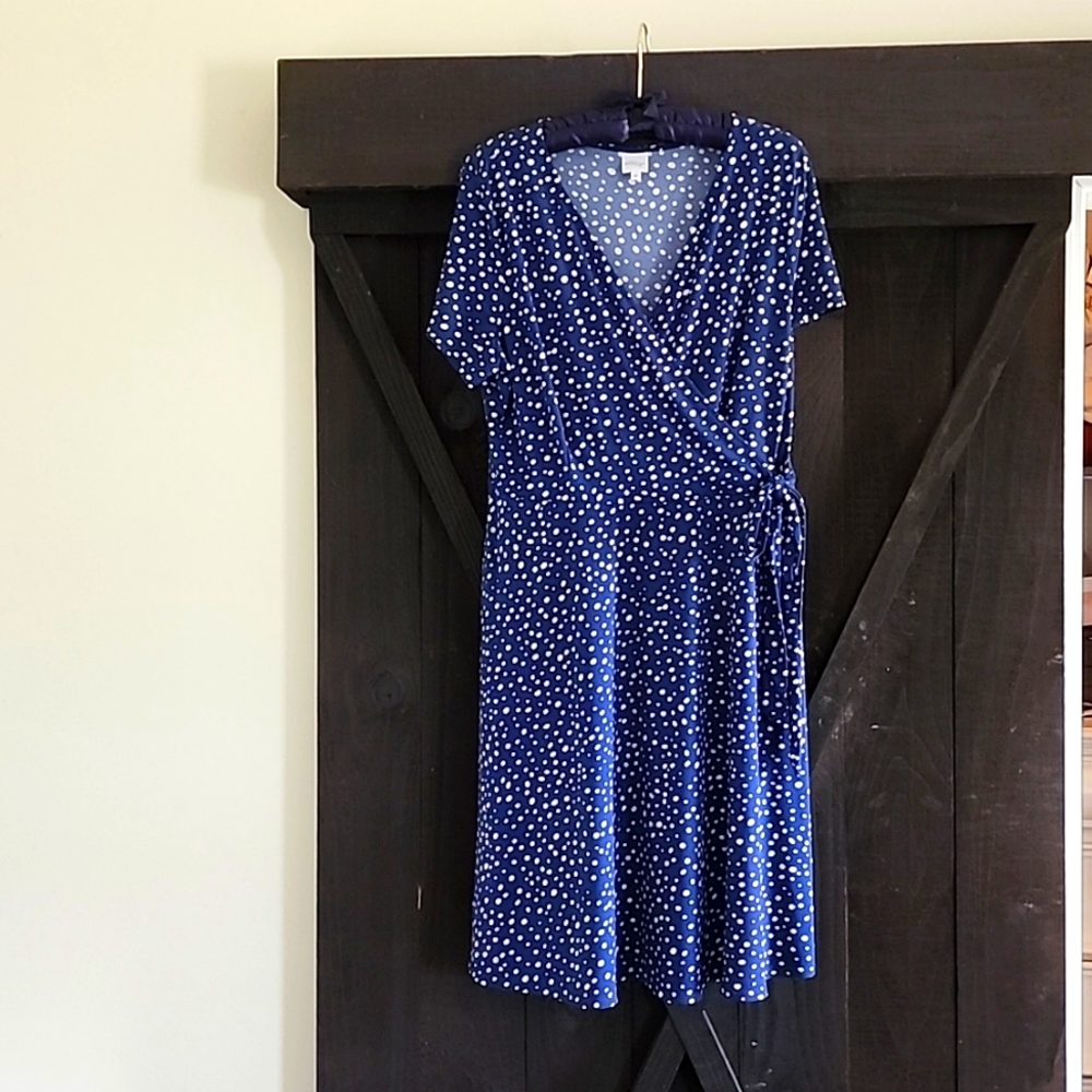 Polka dot blue faux wrap dress with ties.